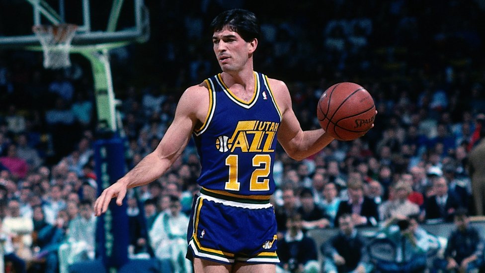 Picture of John Stockton surveying the floor